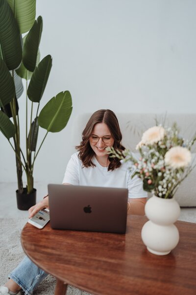 Homefolk Creative humble, authentic personal branding photography woman on laptop