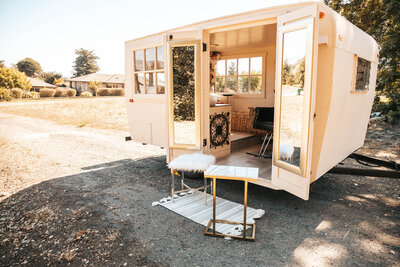 Hair stylist and a client inside a mobile salon