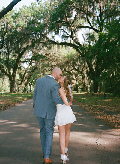 Bride and groom standing together in city hall elopement