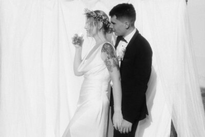 Luxury wedding in Europe – sophisticated bride in a modern wedding gown and groom in a timeless suit.