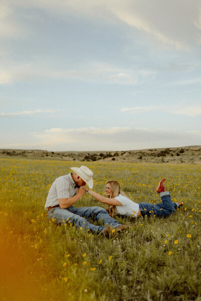 cowboy engagement before their ranch wedding