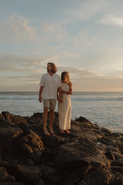 bride and groom on beach in kauai