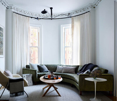 South End Boston brownstone by designer Sarah Scales, featuring original details, gallery white walls, and a mix of mid-century and custom furnishings for a timeless look