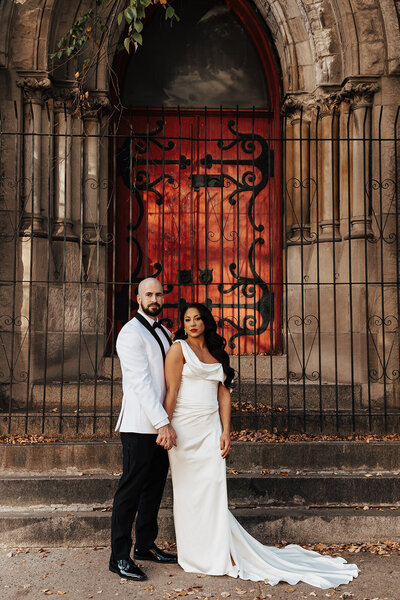 Bride and groom holding hands for wedding portraits in Philly