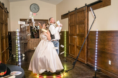 360 video booth with bride and groom