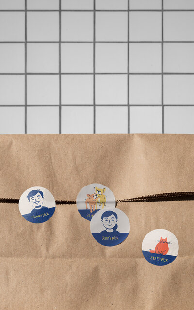 Kraft paper pouch packaging for Winston & Co luxury dog treats featuring blind embossed geometric border design.