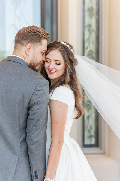 bride and groom at the payson utah temple