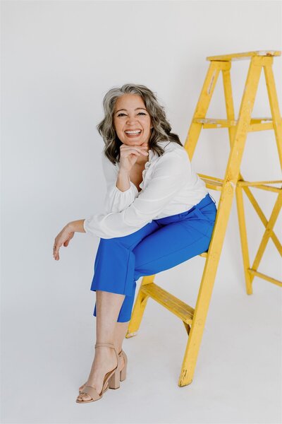 Studio branding session with yellow ladder