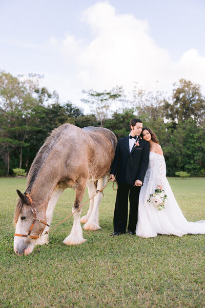 A beautiful outdoor wedding photography Hawaii business capturing a stunning Kualoa wedding.