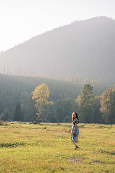 Jennifer standing in field