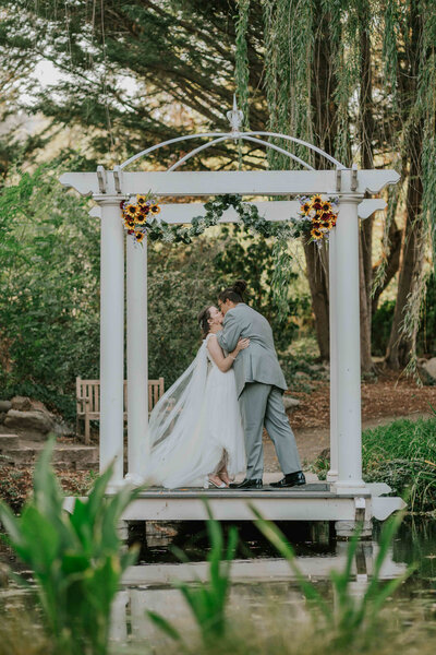 Bride and Groom kiss for the first time.