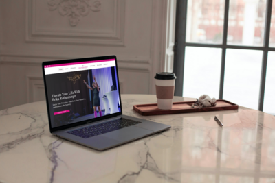 Laptop displaying personal brand website for Erika, designed by The Agency to support business growth