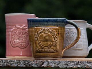3 logo mugs 