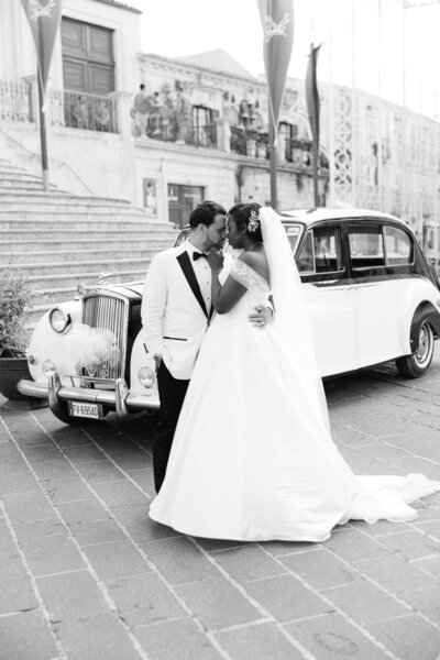a bride and groom enjoying a private moment on their wedding day