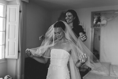 bride and groom walking across the street