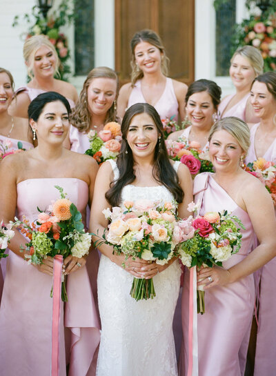Pink bridesmaid dresses at a Wedding at the Colonnade House in Columbus, MS