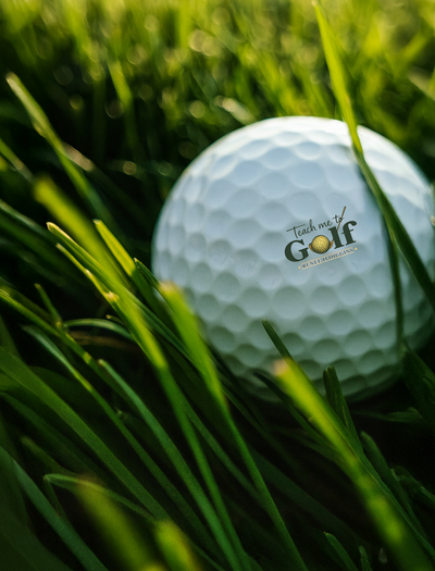 Renee O’Higgins, PGA and LPGA golf instructor Teach Me To Golf golfball with logo.