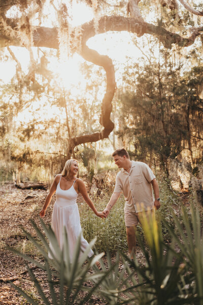 Family session of mother holding child close to her face
