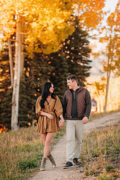 Couple walking in Telluride during the fall colors