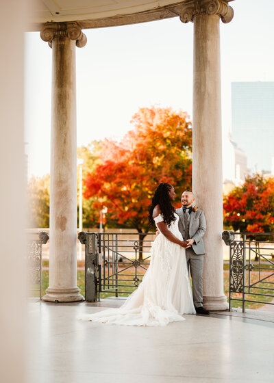 Wedding couple portrait at the Boston Common with fall foliage