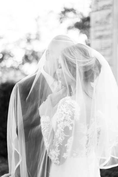 Bride and groom under the veil at Lexington, Kentucky wedding