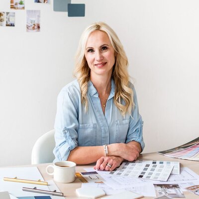 paint colour consultant and decorating coach sitting at desk - online design question and answer with Rose