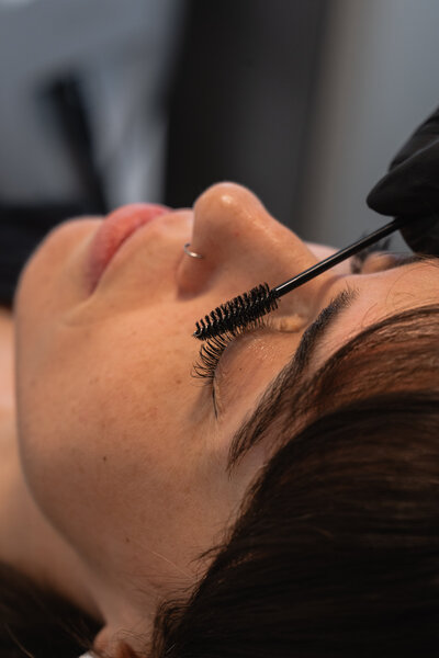 photo of woman receiving eyebrow and eyelash treatment at dublin salon