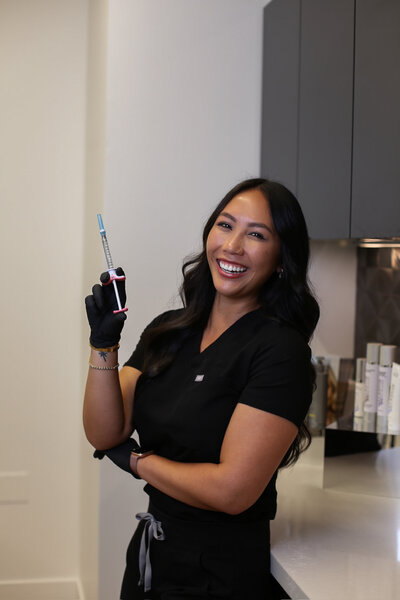 Selena Headshot w Filler Syringe 5