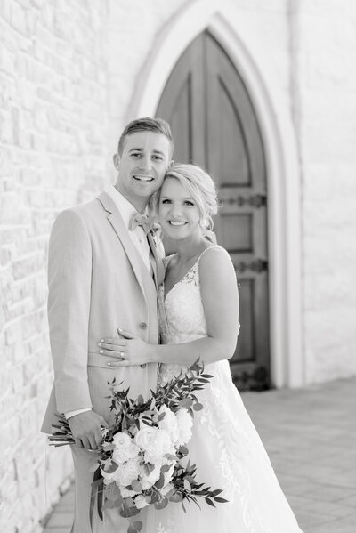 bride and groom on staircase