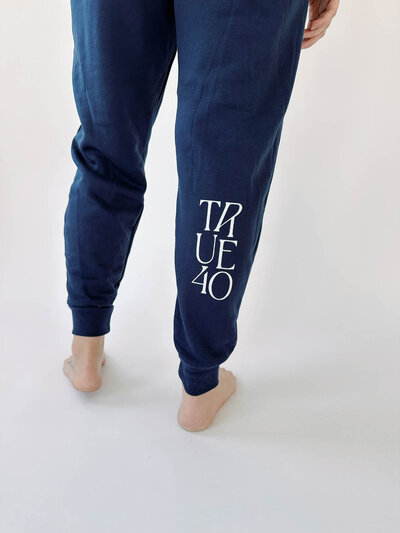 Back of navy joggers with white True40 logo