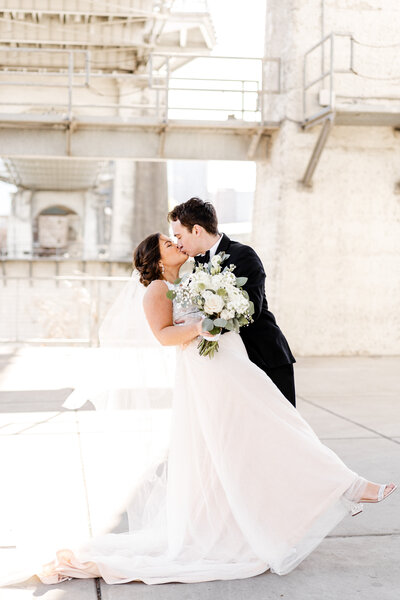 bride and groom kissing