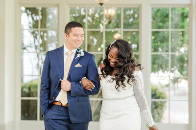 Bride and groom walk up memorial steps at their DC wedding