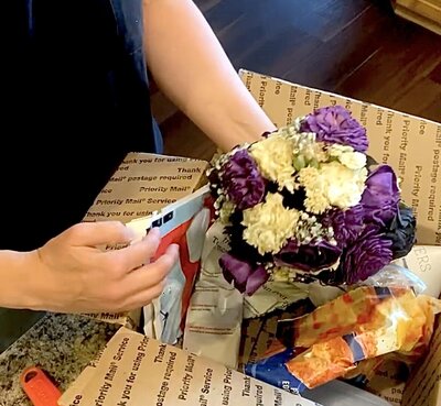 tropical casket funeral flowers at White Pine Funeral Home