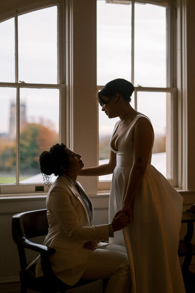 A bride and groom posing for a portrait after their philadelphia wedding
