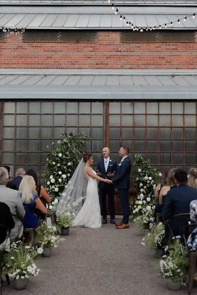Wedding ceremony in courtyard of Blanc Denver