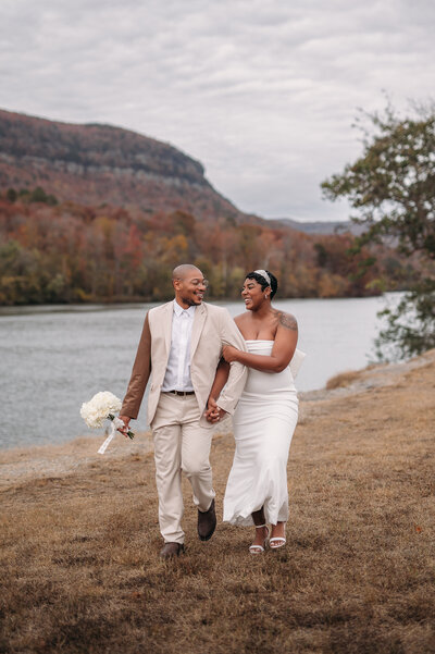 happy couple posed with veil on wedding day in chattanooga