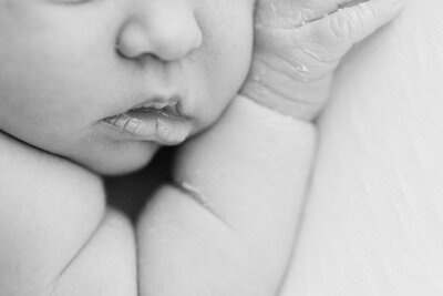 Close up of newborn baby's lips and cheeks in Boise.