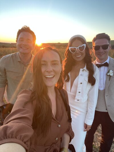 Amy & Nick posing with couple