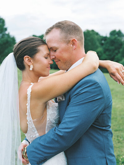 newlyweds hug