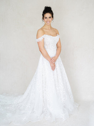 Bride posing in her dress at event planned by event planner minneapolis mn
