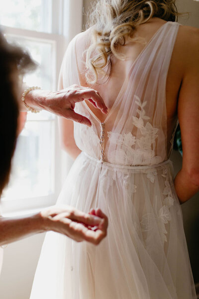 bride's-mother-sews-wedding-dress-button-back-one-arkansas-elopement