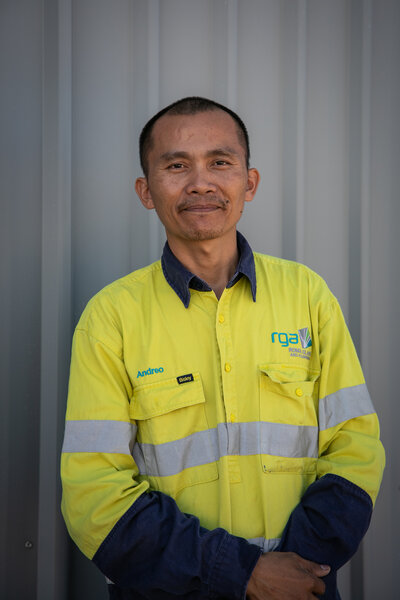 Andy, a skilled professional at Roma Glass & Aluminium, promoting teamwork and accountability in custom glass projects.