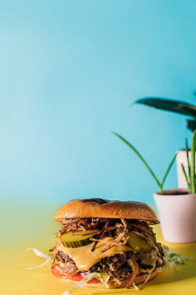This client project for Good Day Cafe in Oxford, MS included a food styling shoot for their menu. White Studio photographed multiple sandwiches, including this The Cider Hog Rules pulled pork sandwich.