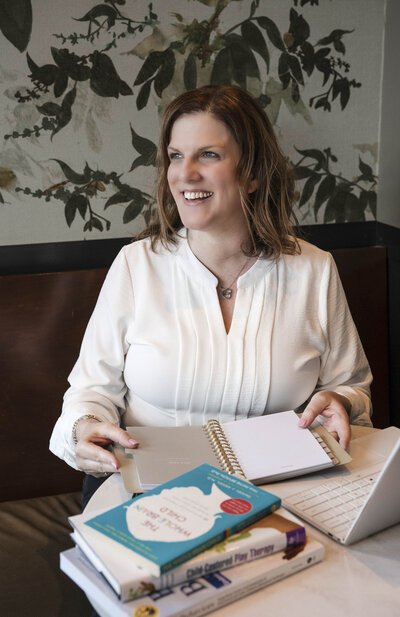 Alison Potter with parenting education books
