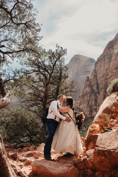 Hiking through mountains for this intimate elopement in Zion National Park.