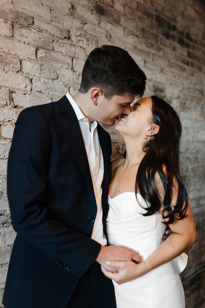 bride and groom kissing