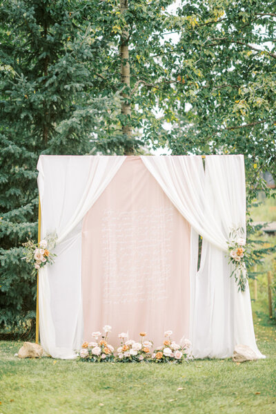 Beautiful blush summer wedding palette with florals by Lovella Lifestyle, whimsical and romantic Edmonton wedding florist, featured on the Brontë Bride Blog.