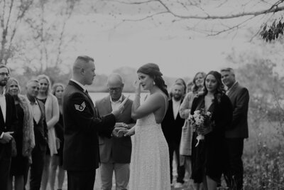 Bride and groom reciting vows at their wedding ceremony