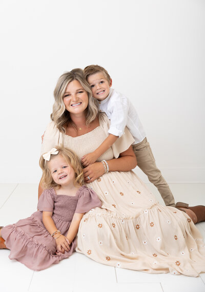 Studio session of a mom and her two kids