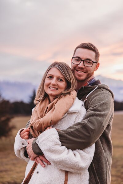Queenstown elopement couple standing in the water in their wedding attire